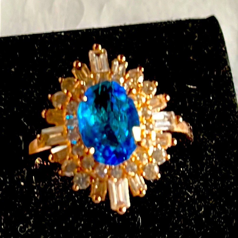 Lab created blue zikon with rose gold plated ring.